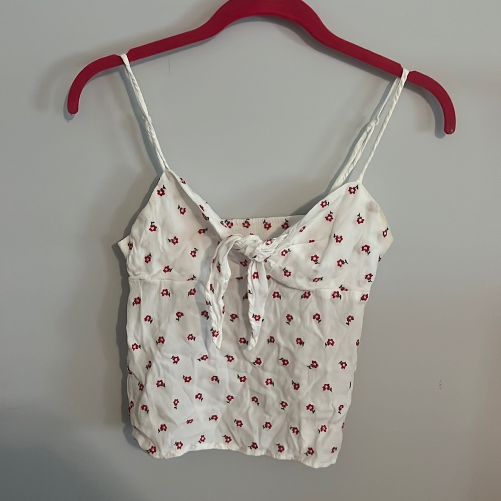 John galt/ brandy Melville white top with stitched red flowers.